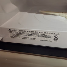 Load image into Gallery viewer, Sharp Stainless Over the counter 24" wide (scratch and dent see description)